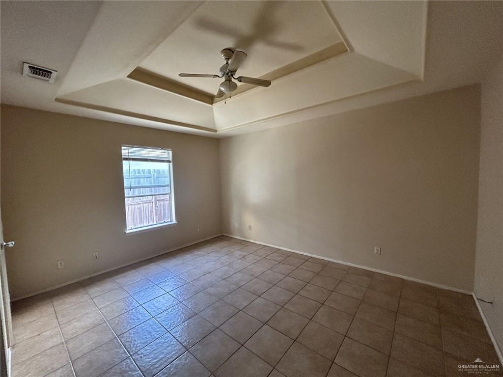 1803 Douglas, Unit 3 Pharr, TX 78577 - Photo 9 of 11 a view of an empty room with a window