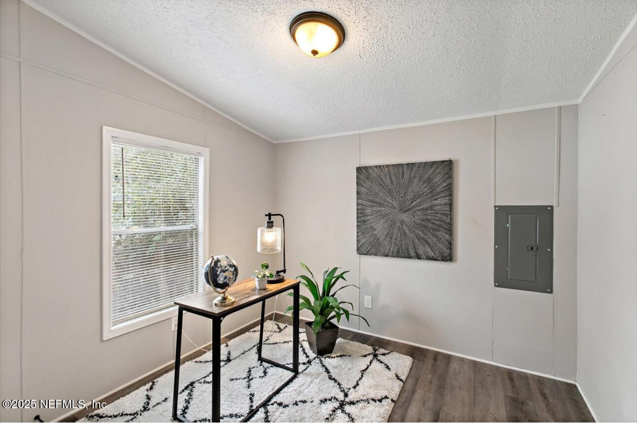 3032 Snell Street Jacksonville, FL 32218 - Photo 12 of 17 a workspace room with furniture and windows