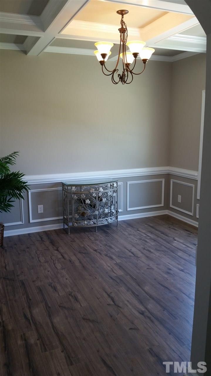 219 Spring Flowers Drive Cameron, NC 28326 - Photo 7 of 12 a view of a livingroom with wooden floor
