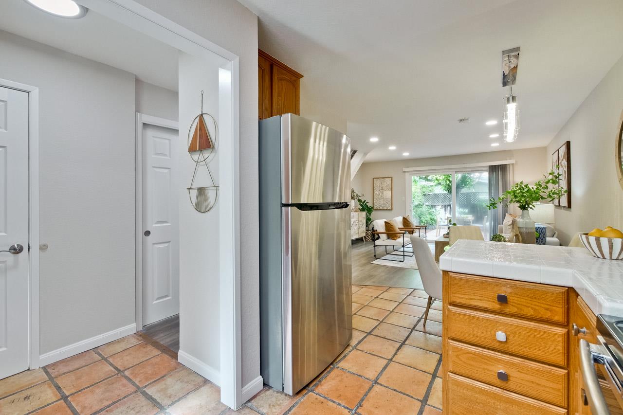 1046 Wright Avenue, Unit J Mountain View, CA 94043 - Photo 14 of 36 a view of a kitchen and living room