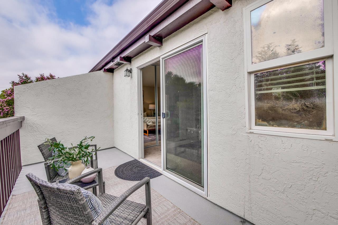 1046 Wright Avenue, Unit J Mountain View, CA 94043 - Photo 20 of 36 a outdoor living space with furniture and a potted plant