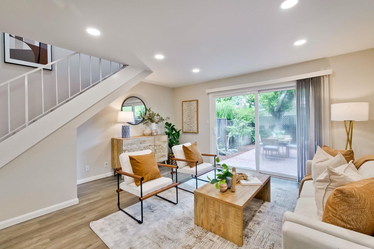 1046 Wright Avenue, Unit J Mountain View, CA 94043 - Photo 3 of 36 a living room with furniture and a large window