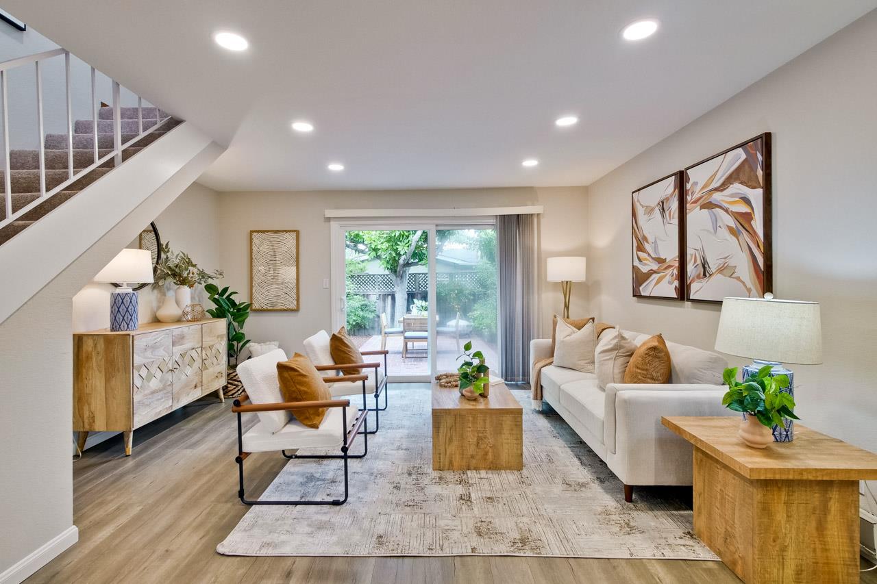 1046 Wright Avenue, Unit J Mountain View, CA 94043 - Photo 5 of 36 a living room with furniture and a large window