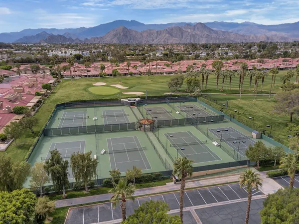 a view of a city with a lake