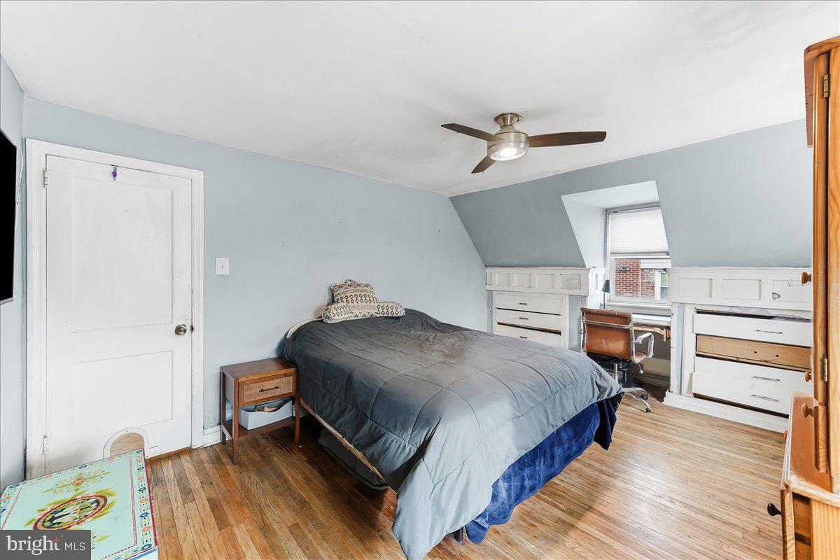 601 Willowbrook Road Havertown, PA 19083 - Photo 15 of 25 a bedroom with a bed and wooden floor