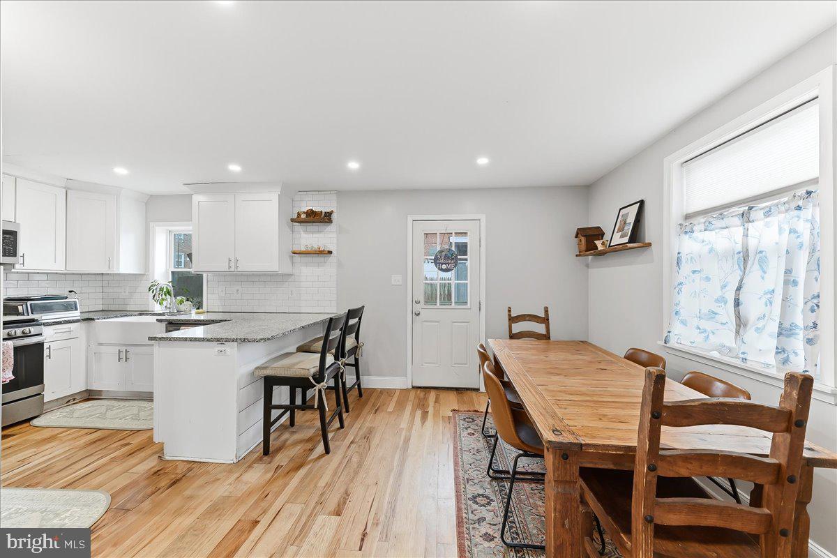 601 Willowbrook Road Havertown, PA 19083 - Photo 6 of 25 a kitchen with a table and chairs in it