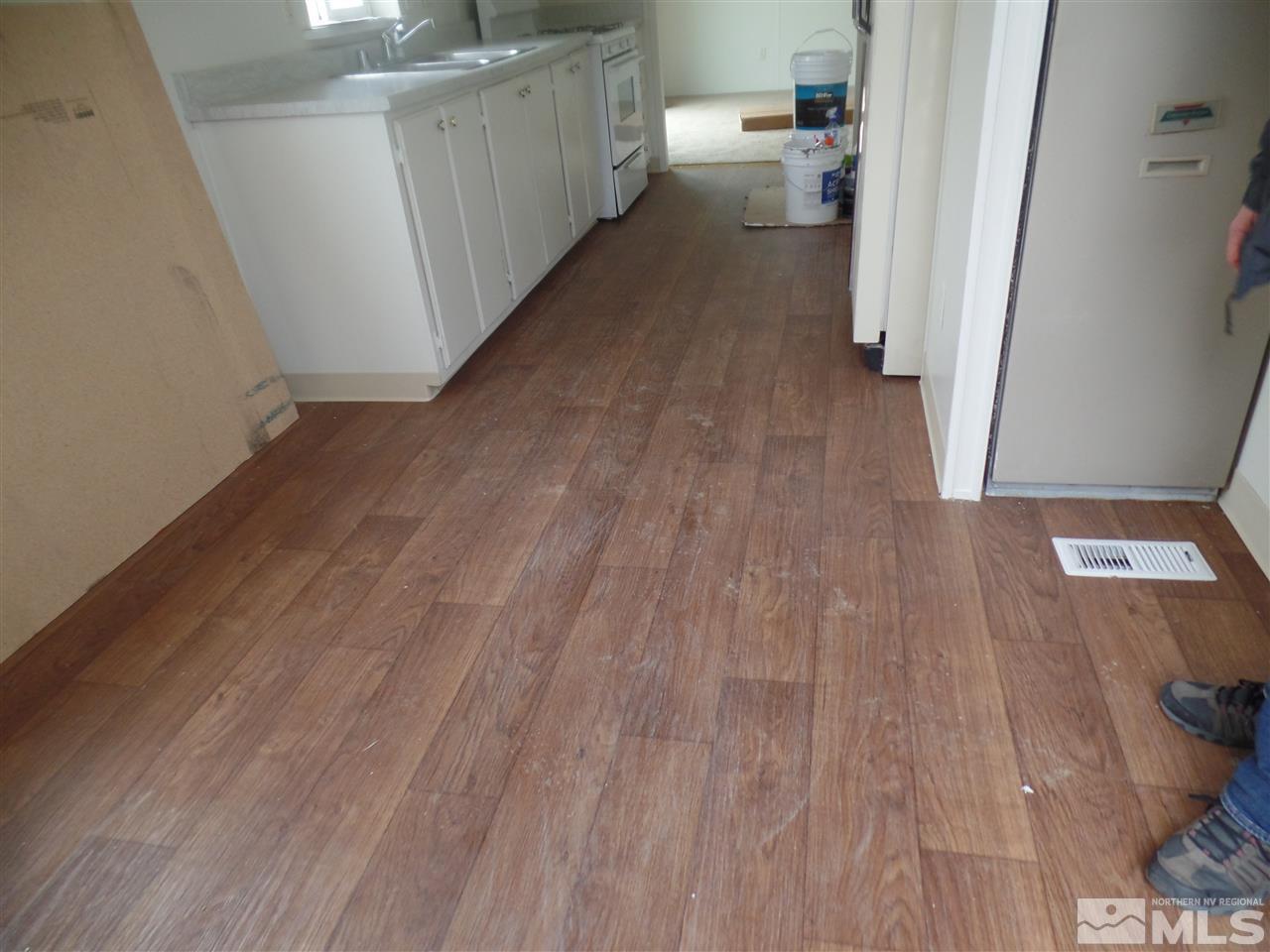 1055 Chisholm Trail Reno, NV 89506 - Photo 2 of 9 a view of a kitchen from a hallway