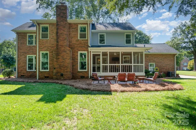 a house view with a sitting space and garden