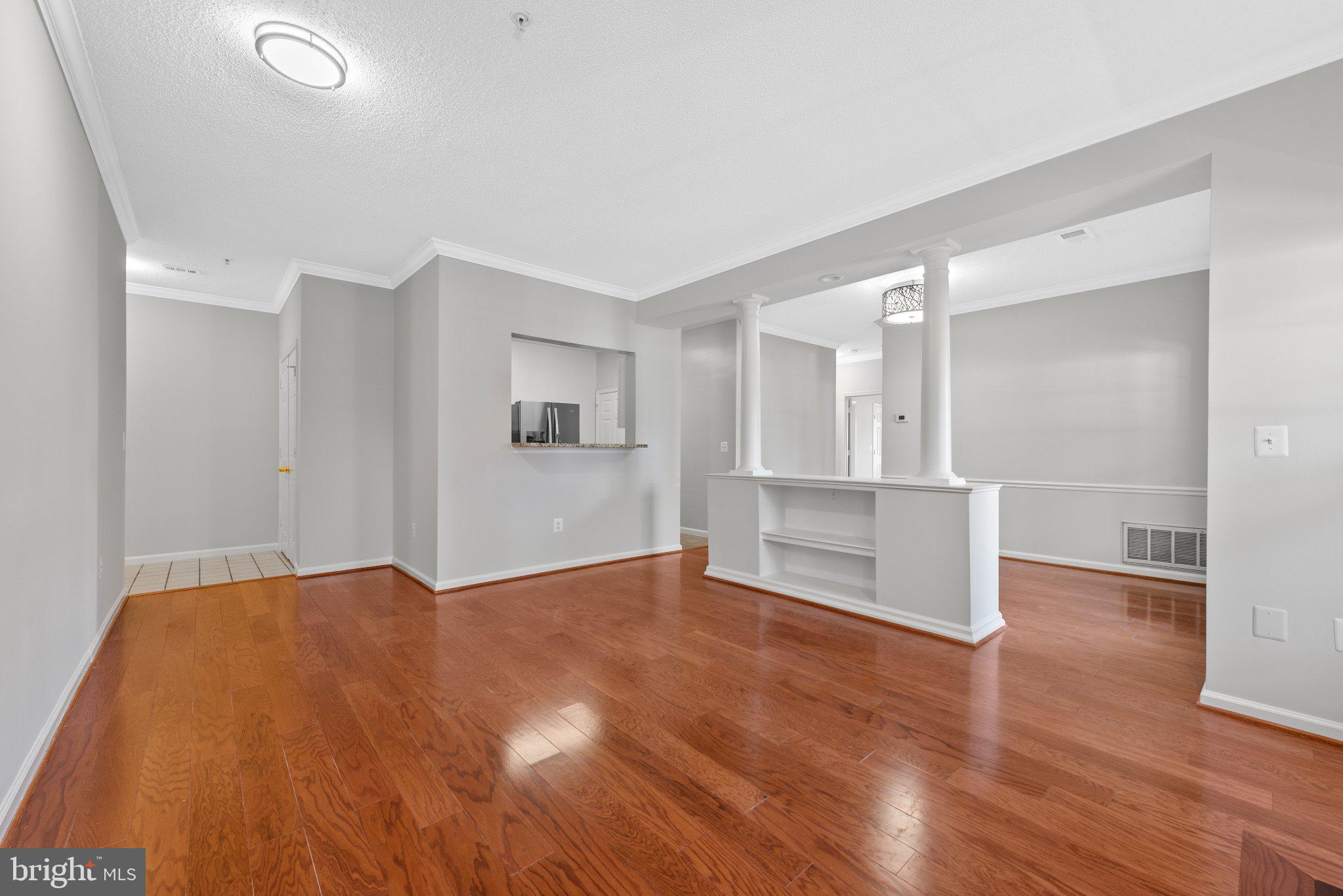 12001 Taliesin Place, Unit 12 Reston, VA 20190 - Photo 5 of 20 View from Living Room towards Entrance & Kitchen