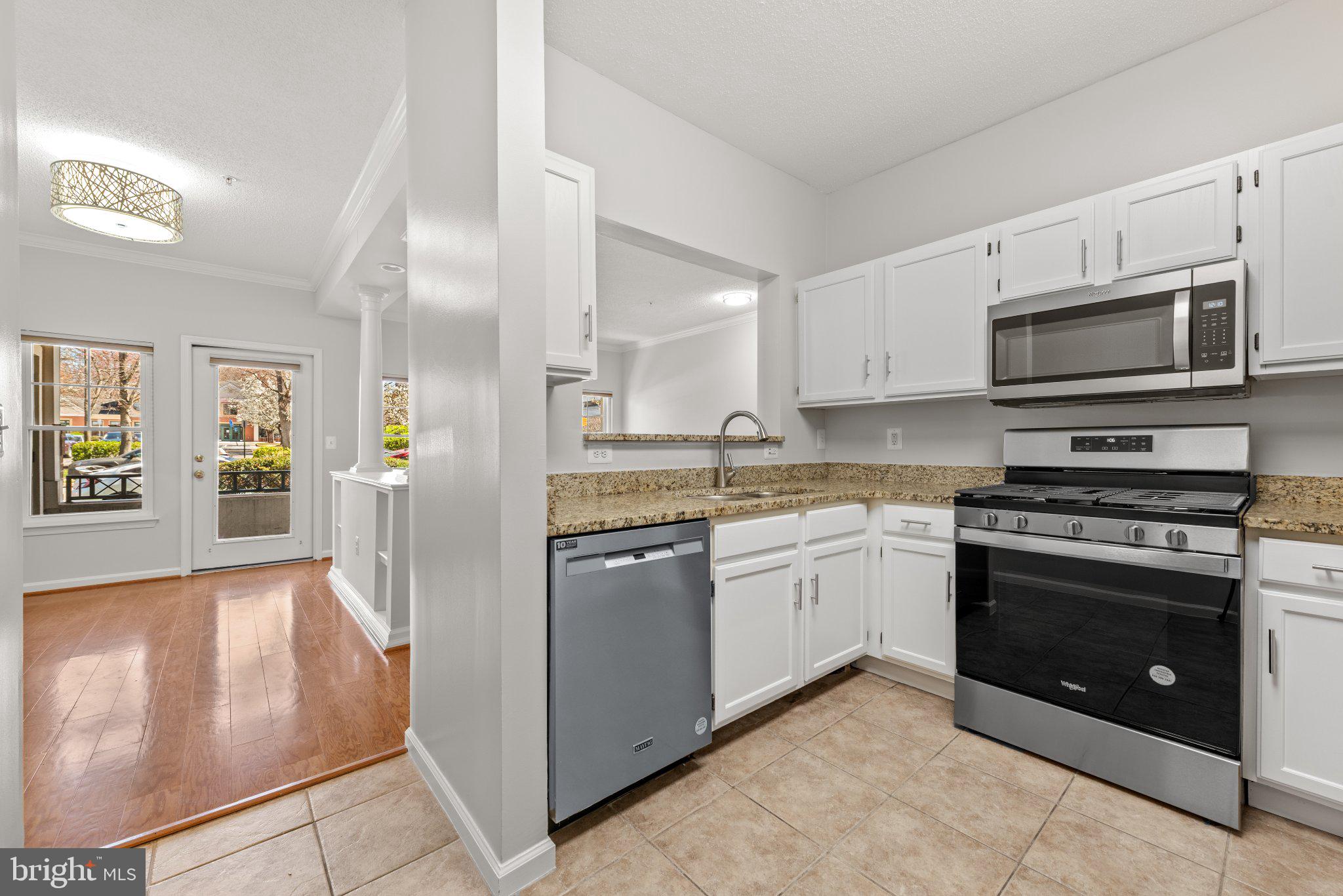 12001 Taliesin Place, Unit 12 Reston, VA 20190 - Photo 10 of 20 Kitchen: New Microwave & Newer appliances