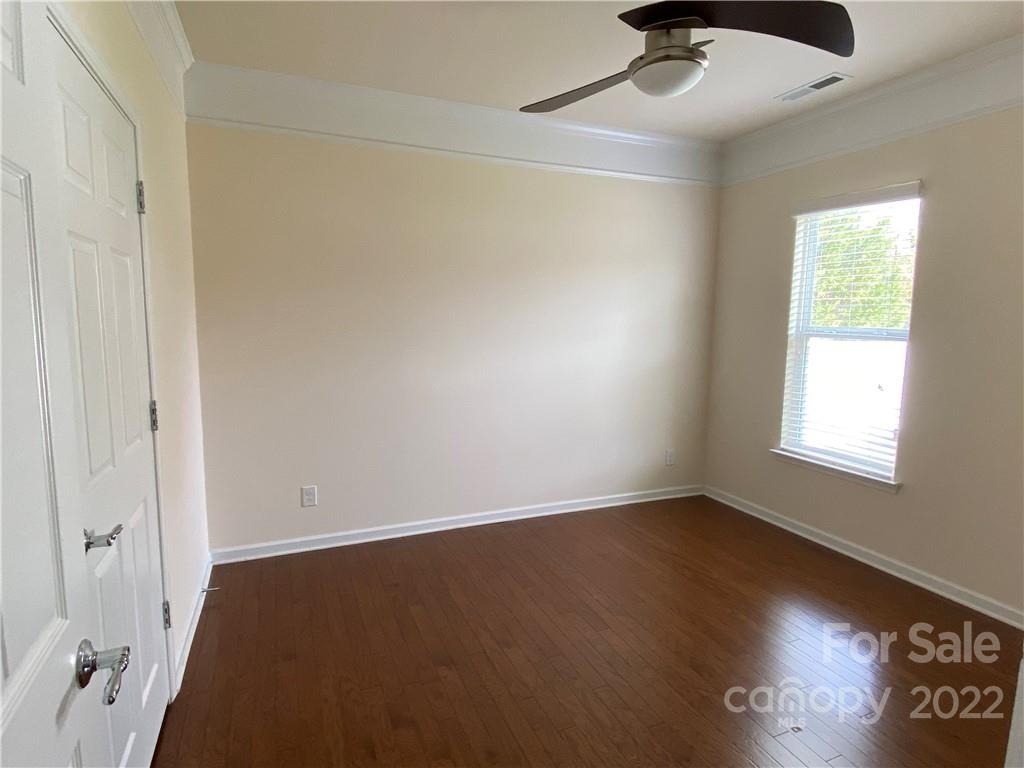 8019 Red Water Road Charlotte, NC 28277 - Photo 6 of 13 an empty room with a window