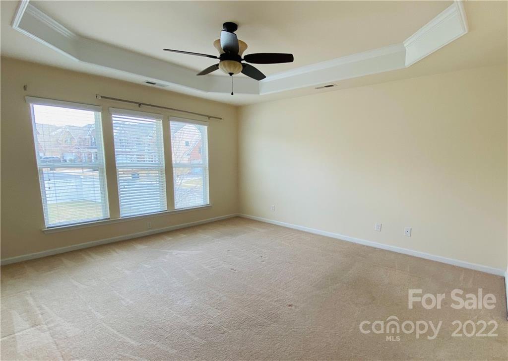 8019 Red Water Road Charlotte, NC 28277 - Photo 7 of 13 a view of an empty room with a window