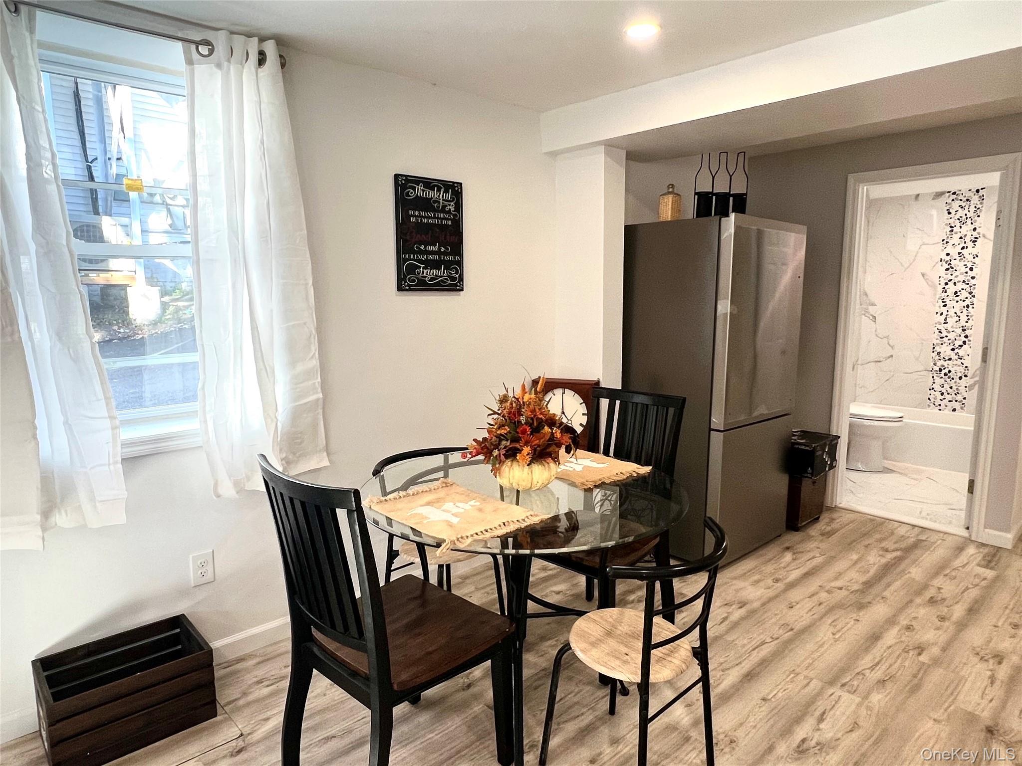 126 West Main Street, Unit 2 Middletown, NY 10940 - Photo 4 of 15 Dining area with light wood-type flooring