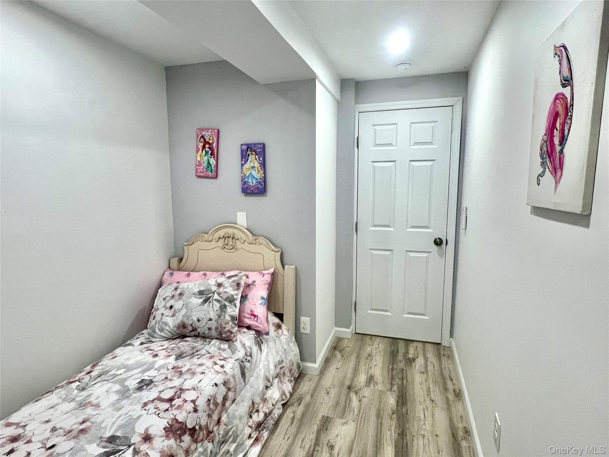 126 West Main Street, Unit 2 Middletown, NY 10940 - Photo 10 of 15 Bedroom featuring baseboards and light wood-style floors