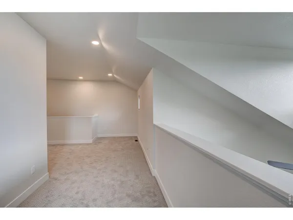 a view of a room with a hallway