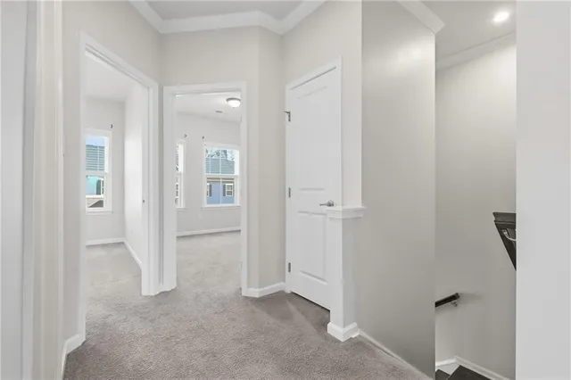 an empty room with closet and a bathroom