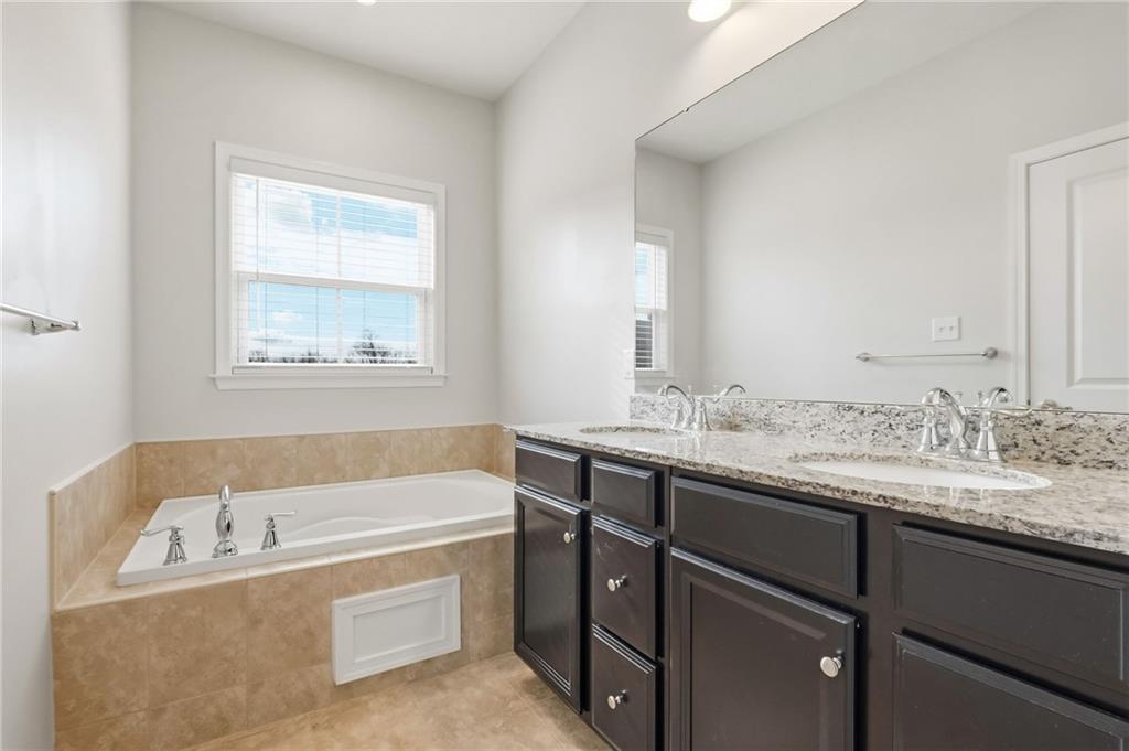 3000 Mahican Circle Mars, PA 16046 - Photo 29 of 39 a bathroom with a tub sink and mirror