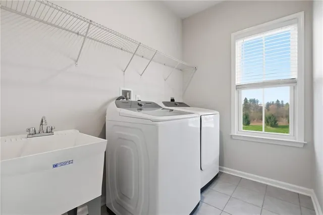 a utility room with dryer and washer