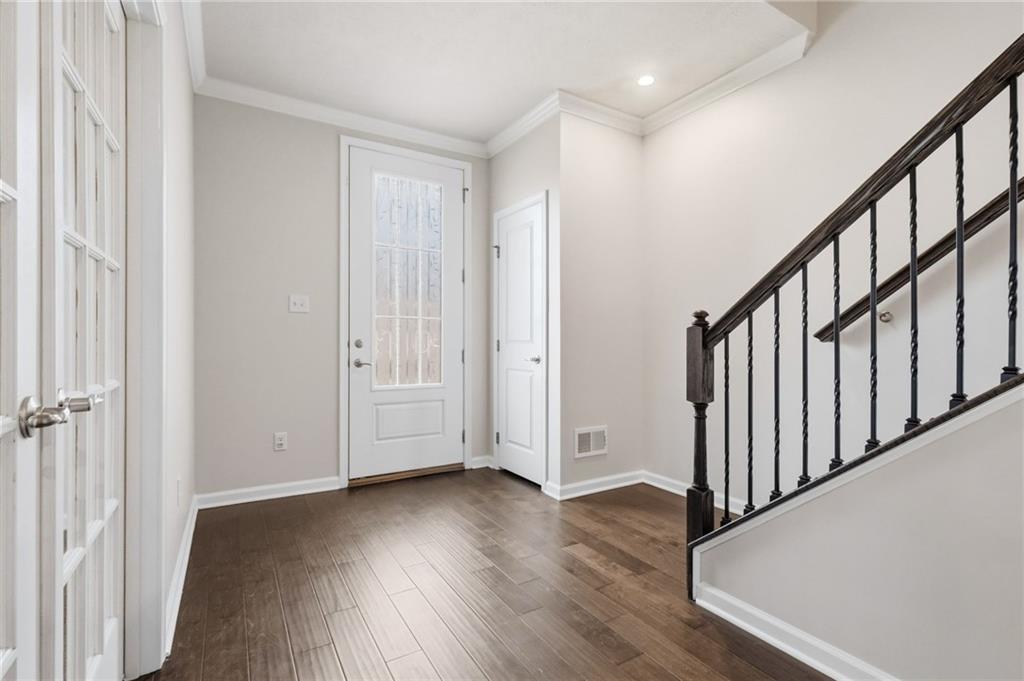 3000 Mahican Circle Mars, PA 16046 - Photo 5 of 39 a view of a hallway with wooden floor and staircase