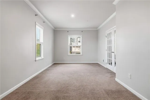 an empty room with windows