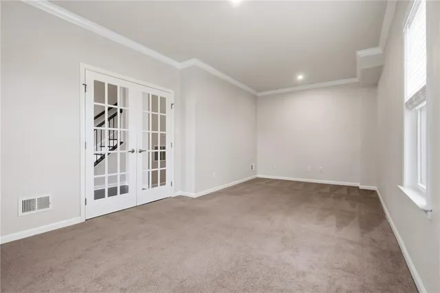 an empty room with windows