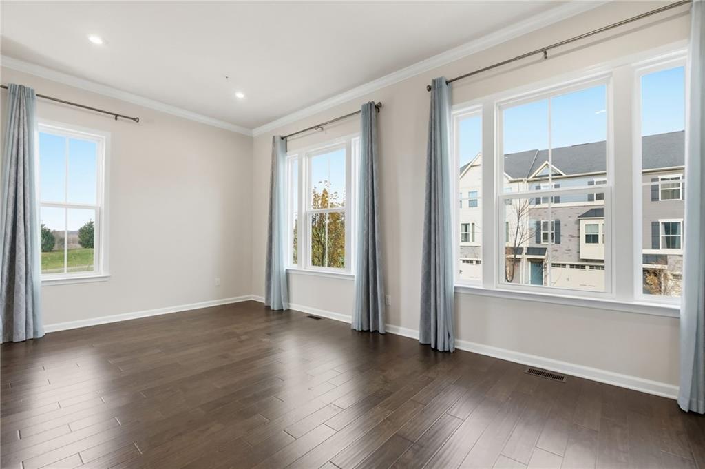 3000 Mahican Circle Mars, PA 16046 - Photo 10 of 39 an empty room with wooden floor and windows