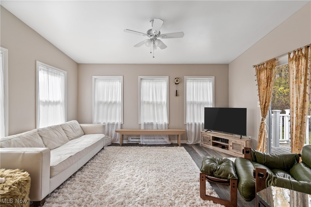 4786 Mayfair Road North Canton, OH 44720 - Photo 14 of 38 Living room with a ceiling fan and wood finished floors
