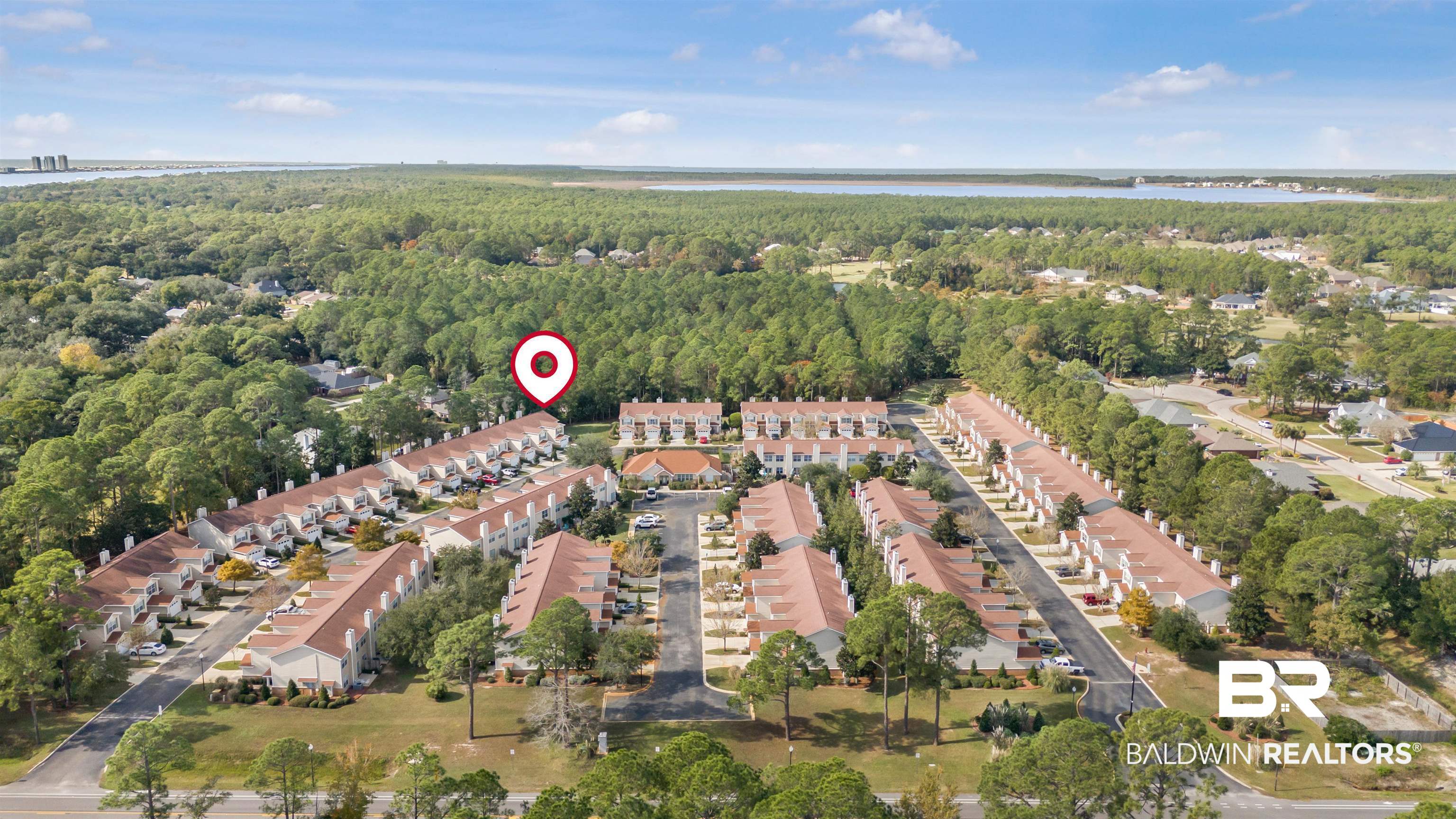 1517 Regency Road, Unit 68 Gulf Shores, AL 36542 - Photo 43 of 43 Drone / aerial view with a water view