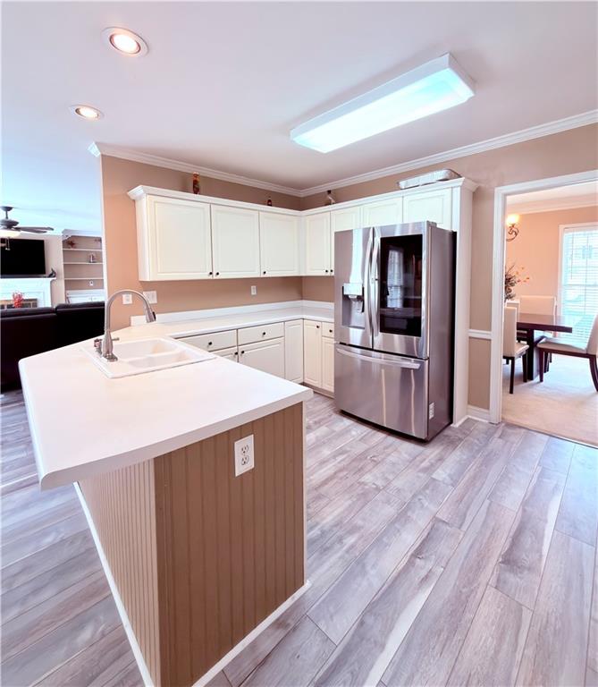 3830 Peachbluff Court Duluth, GA 30097 - Photo 14 of 39 a kitchen with a sink a microwave a stove and refrigerator