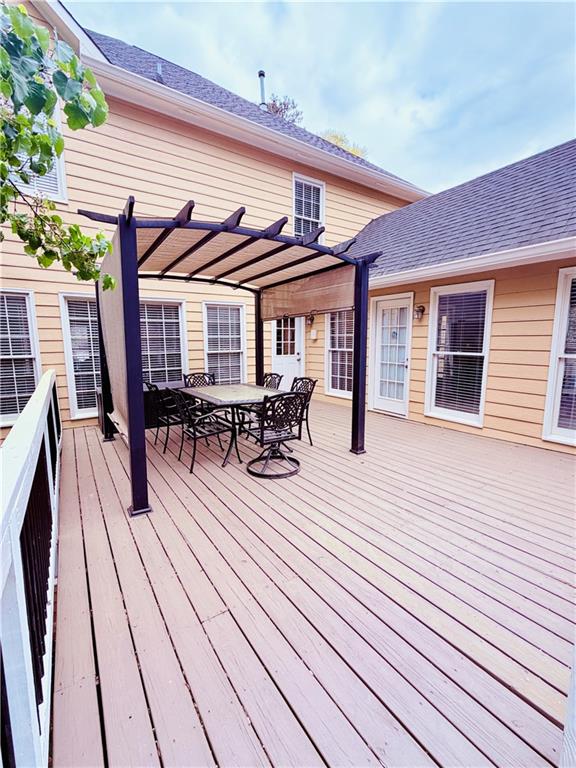3830 Peachbluff Court Duluth, GA 30097 - Photo 20 of 39 a view of dining room and wooden deck