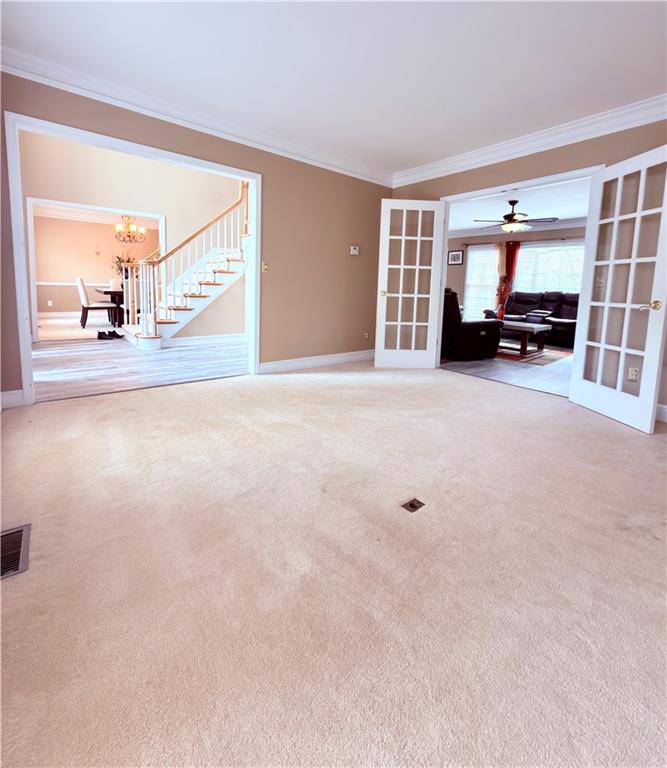 3830 Peachbluff Court Duluth, GA 30097 - Photo 6 of 39 a view of a livingroom with furniture and a flat screen tv
