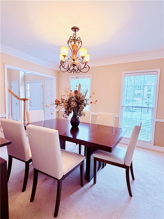 3830 Peachbluff Court Duluth, GA 30097 - Photo 7 of 39 a view of a dining room with furniture window and wooden floor