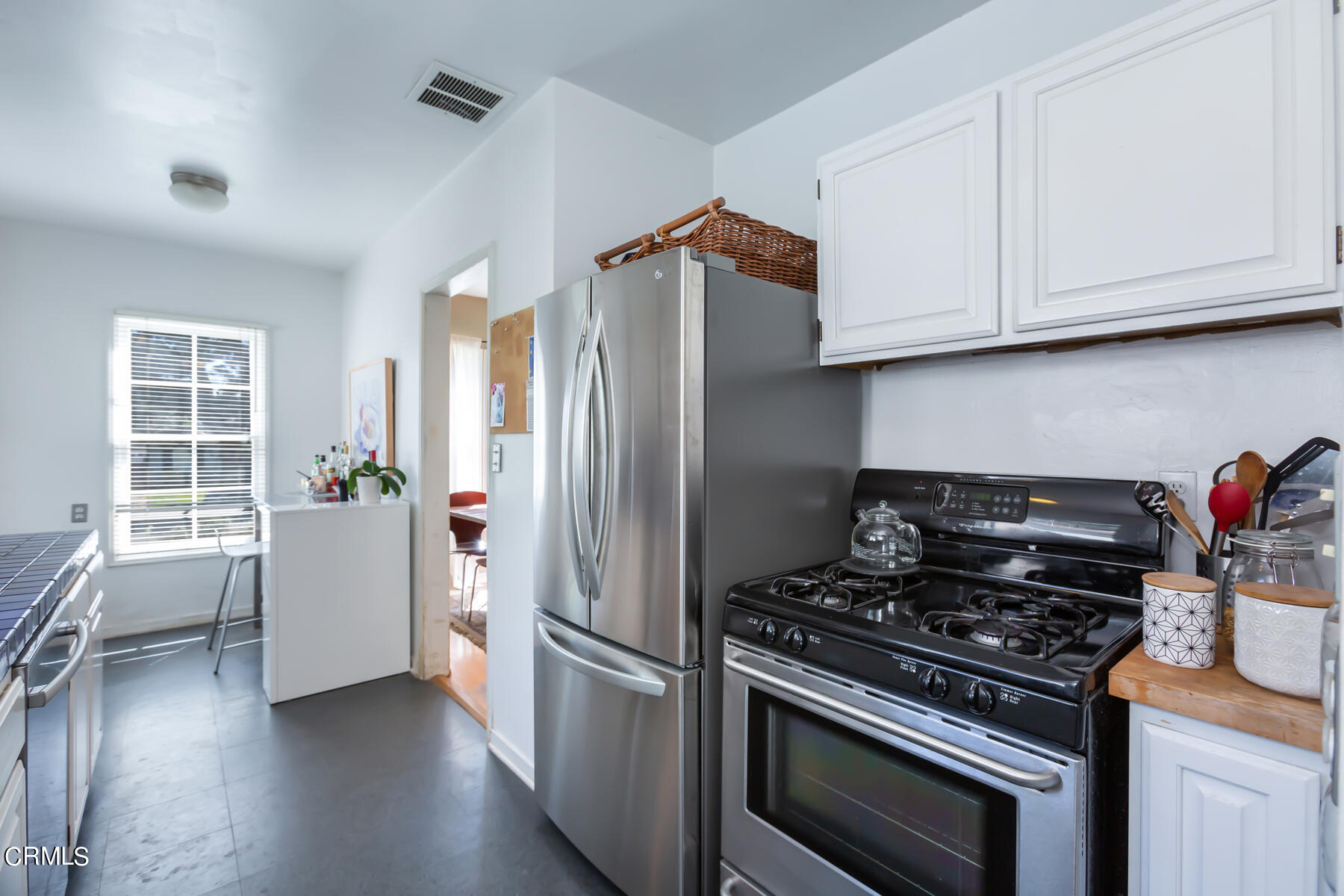 781 Morada Place Altadena, CA 91001 - Photo 17 of 41 a kitchen with a stove and a refrigerator