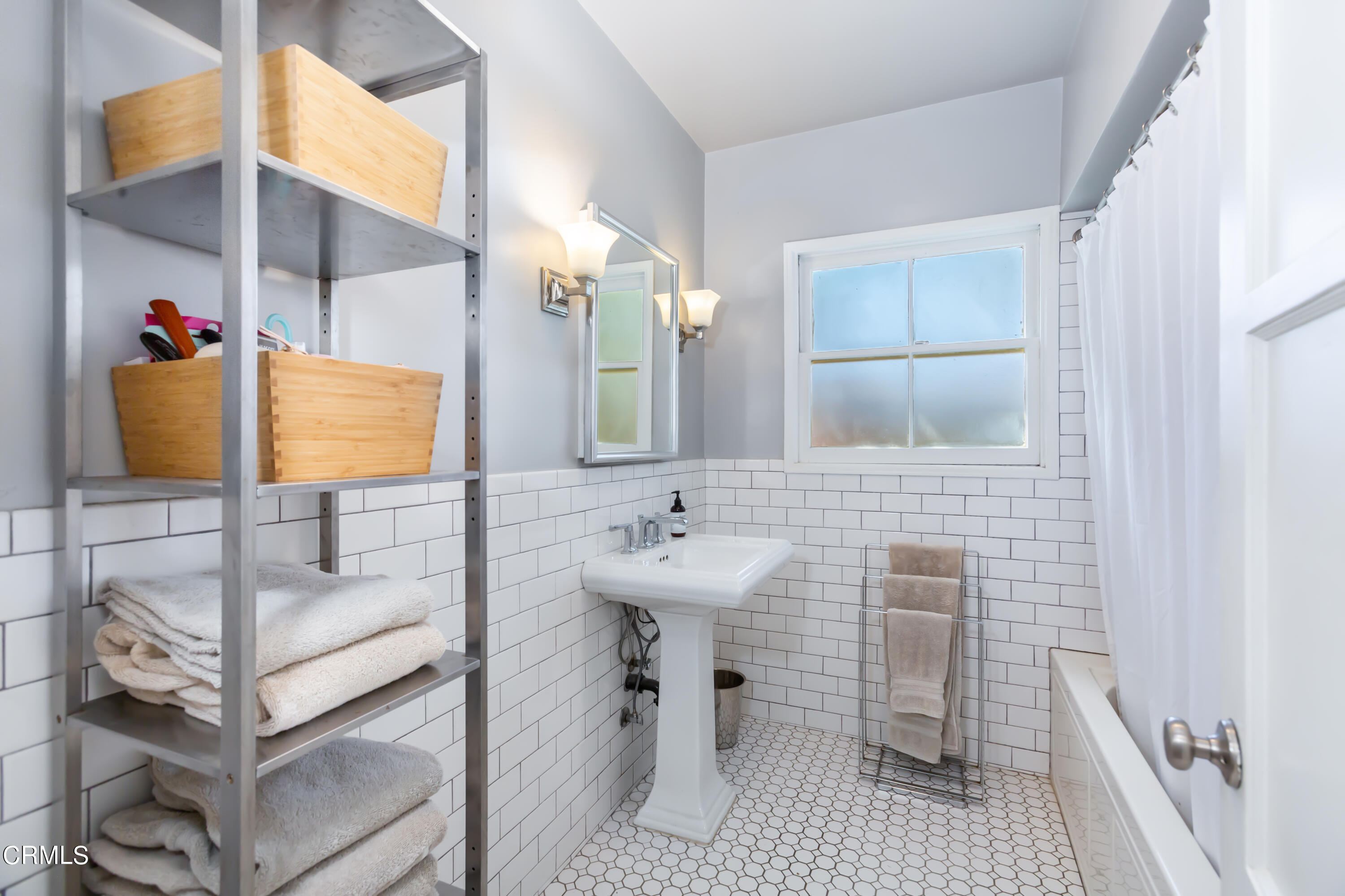781 Morada Place Altadena, CA 91001 - Photo 20 of 41 a bathroom with a sink and a mirror