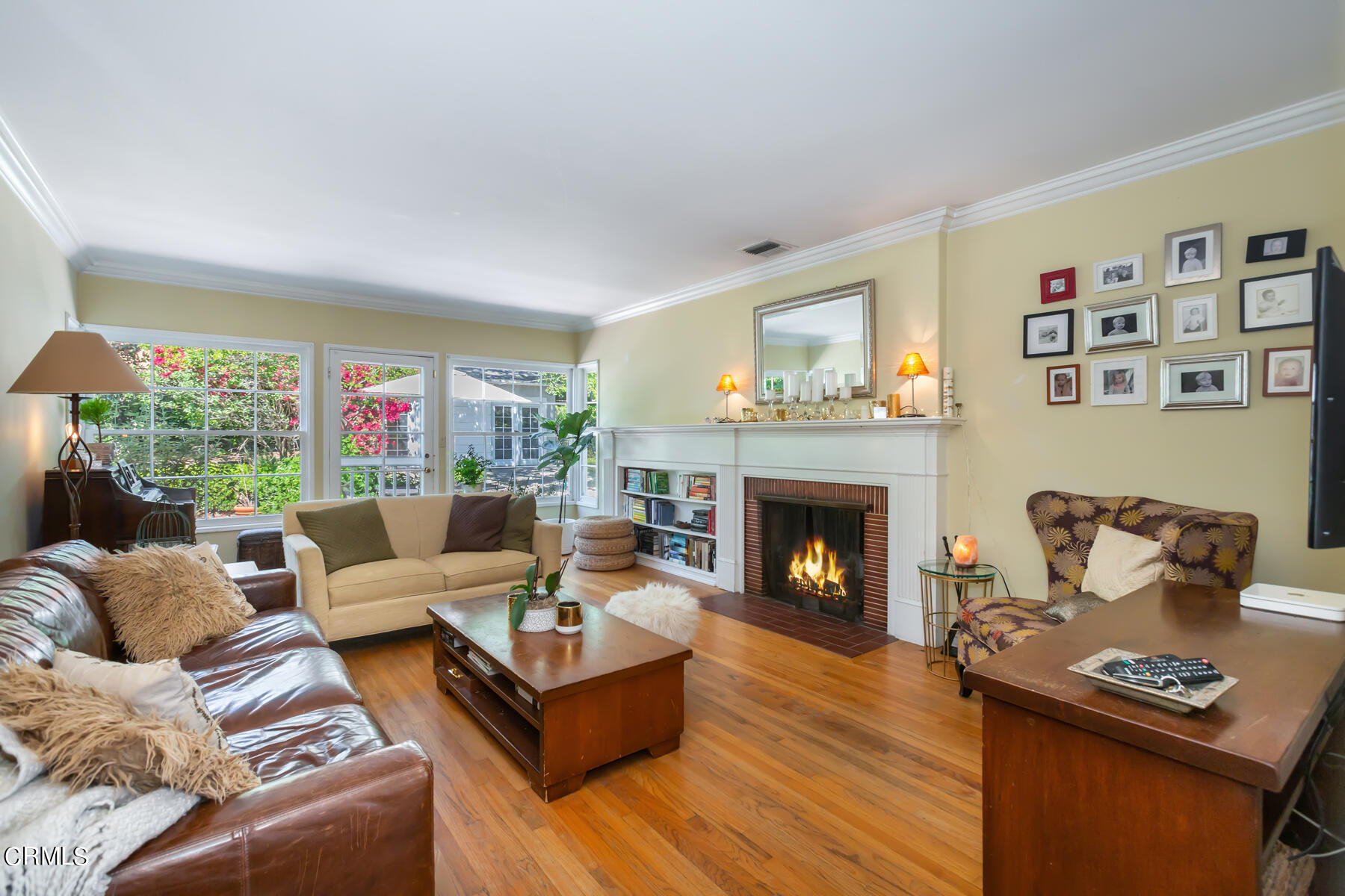 781 Morada Place Altadena, CA 91001 - Photo 2 of 41 a living room with furniture and a fireplace