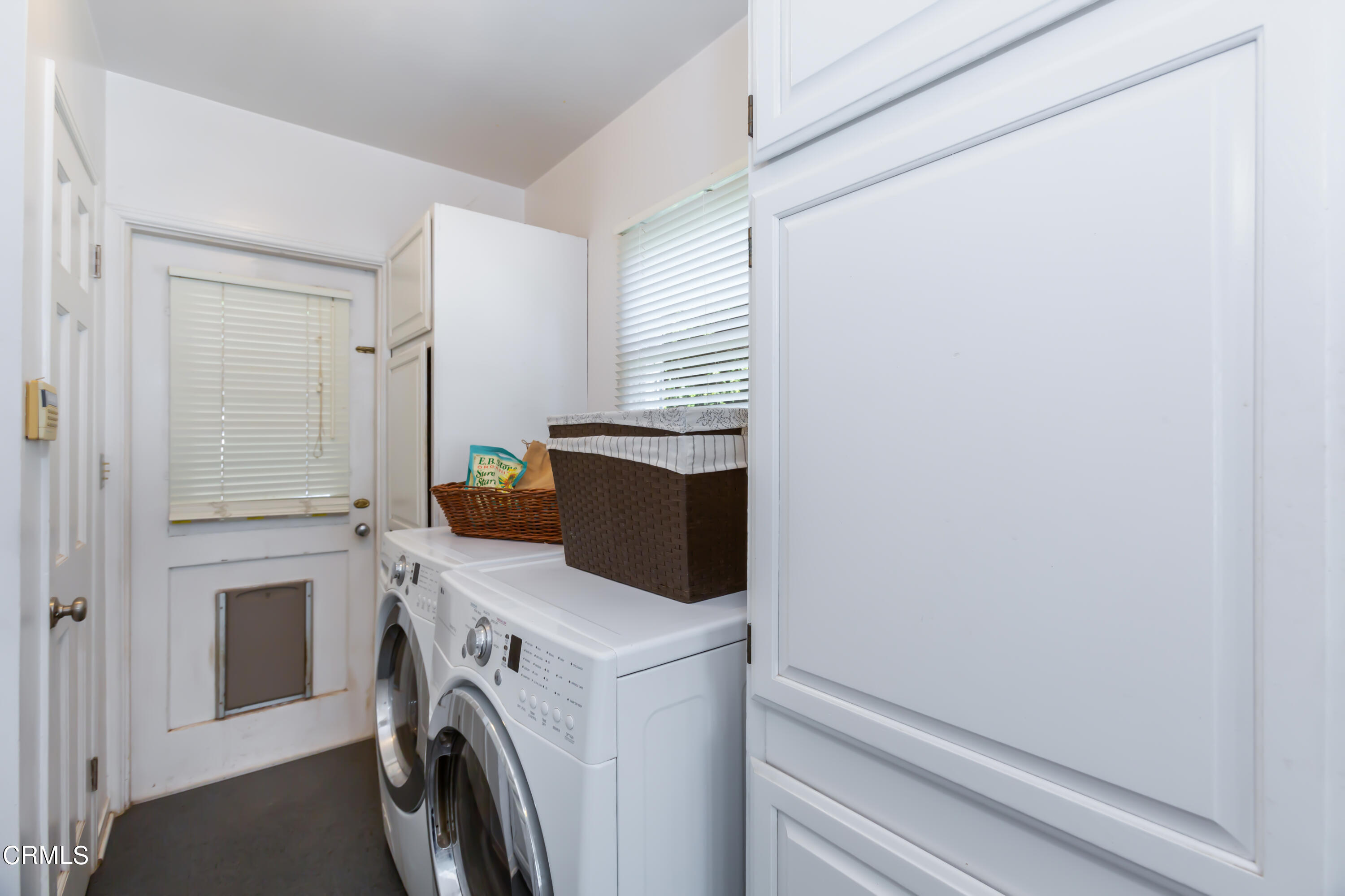 781 Morada Place Altadena, CA 91001 - Photo 29 of 41 a utility room with dryer and washer