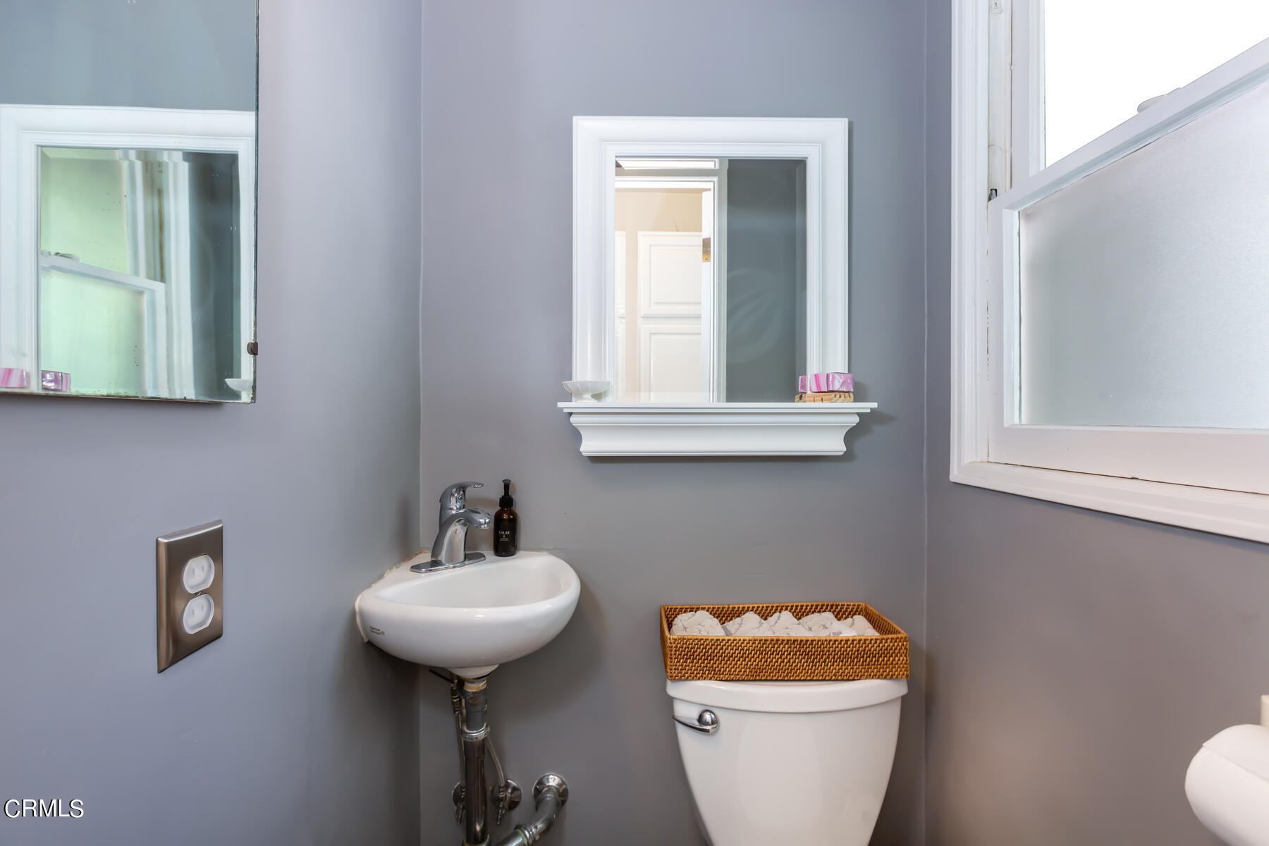 781 Morada Place Altadena, CA 91001 - Photo 31 of 41 a bathroom with a toilet a sink and a window
