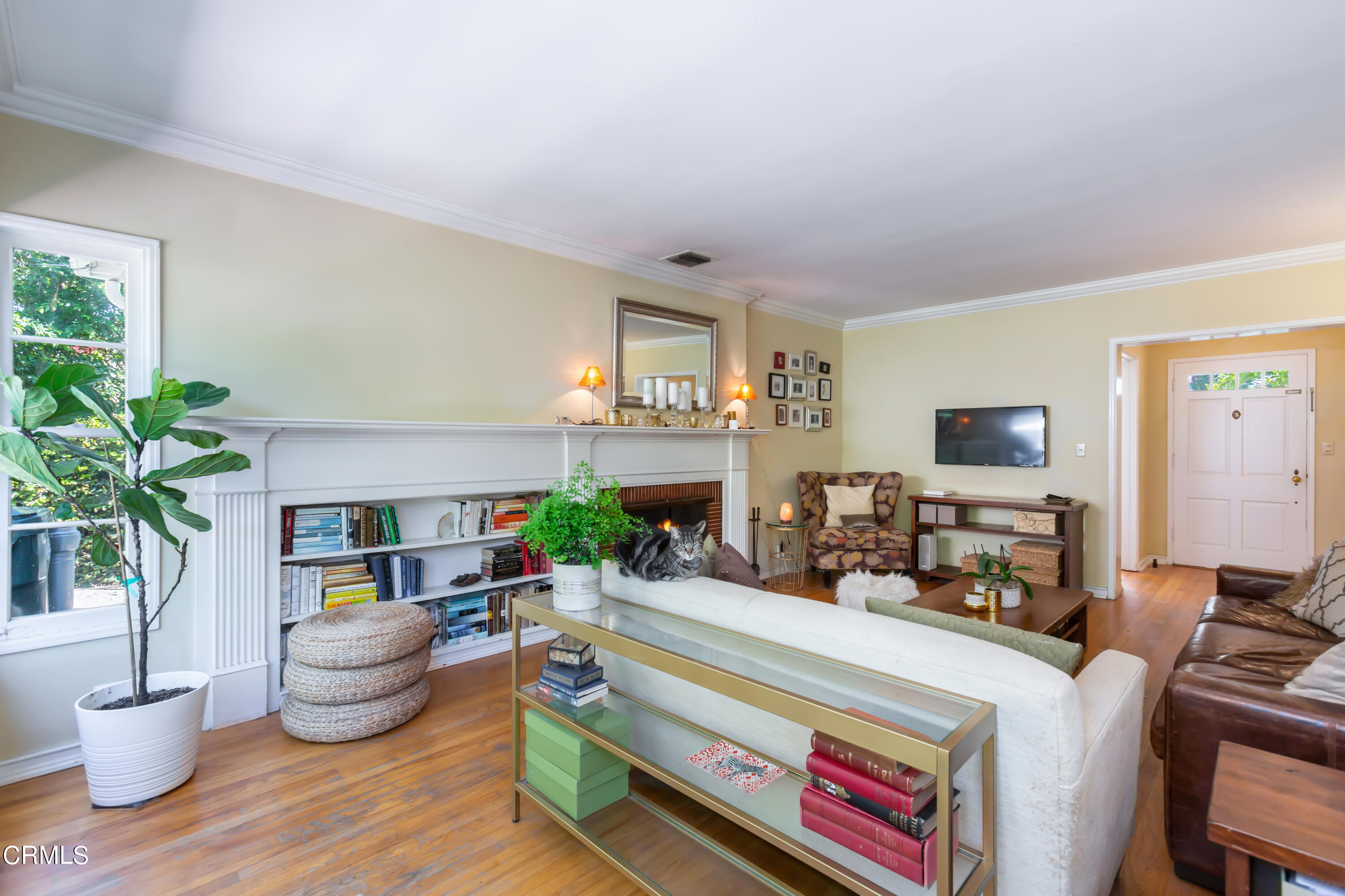 781 Morada Place Altadena, CA 91001 - Photo 4 of 41 a living room with furniture and a potted plant