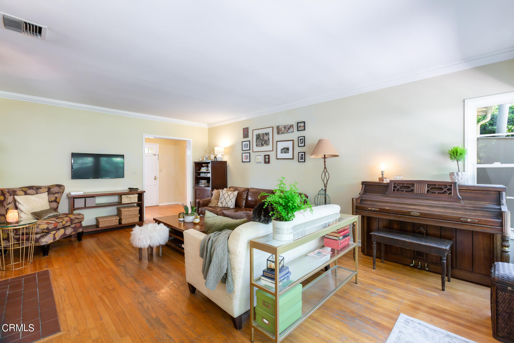 781 Morada Place Altadena, CA 91001 - Photo 8 of 41 a living room with furniture and a flat screen tv