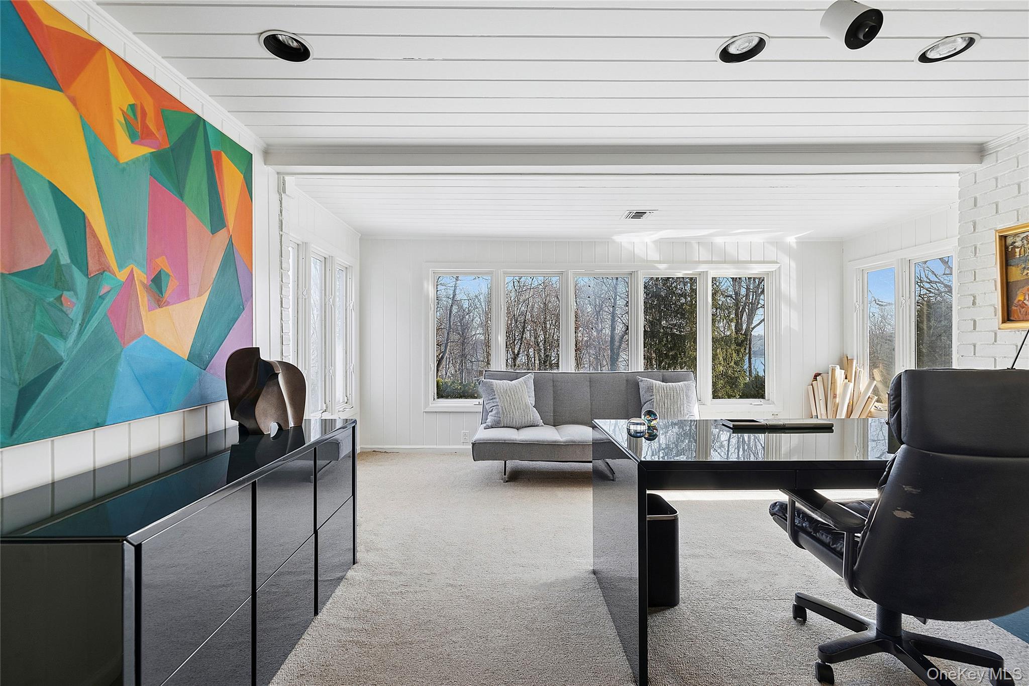 45 SE Road Sands Point, NY 11050 - Photo 17 of 36 a living room with furniture
