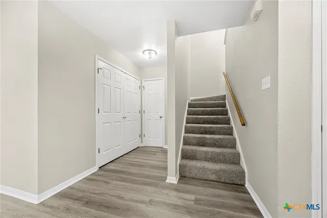 a view of an entryway with staircase