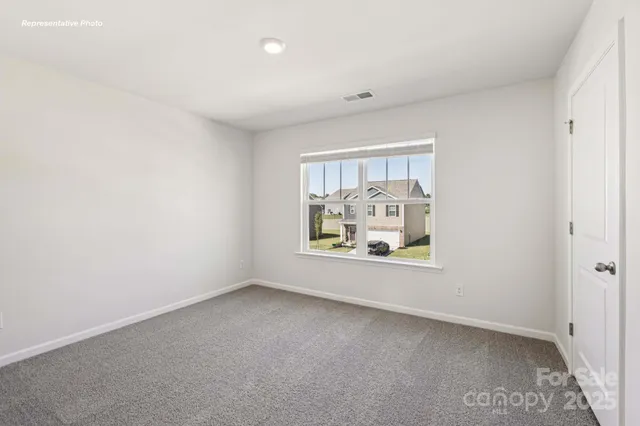 an empty room with window