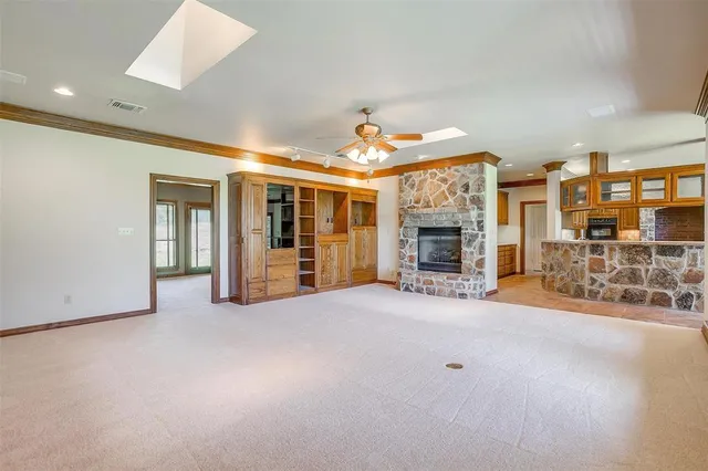 a kitchen with stainless steel appliances granite countertop a stove sink and cabinets