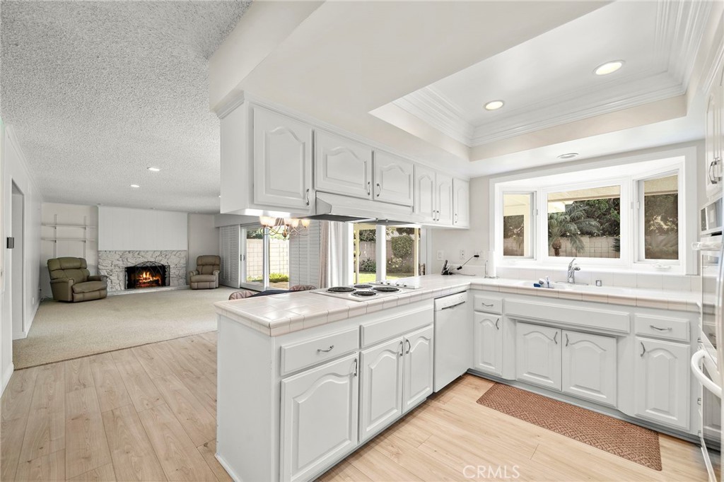 10202 Meredith Drive Huntington Beach, CA 92646 - Photo 10 of 13 Kitchen opens to family room