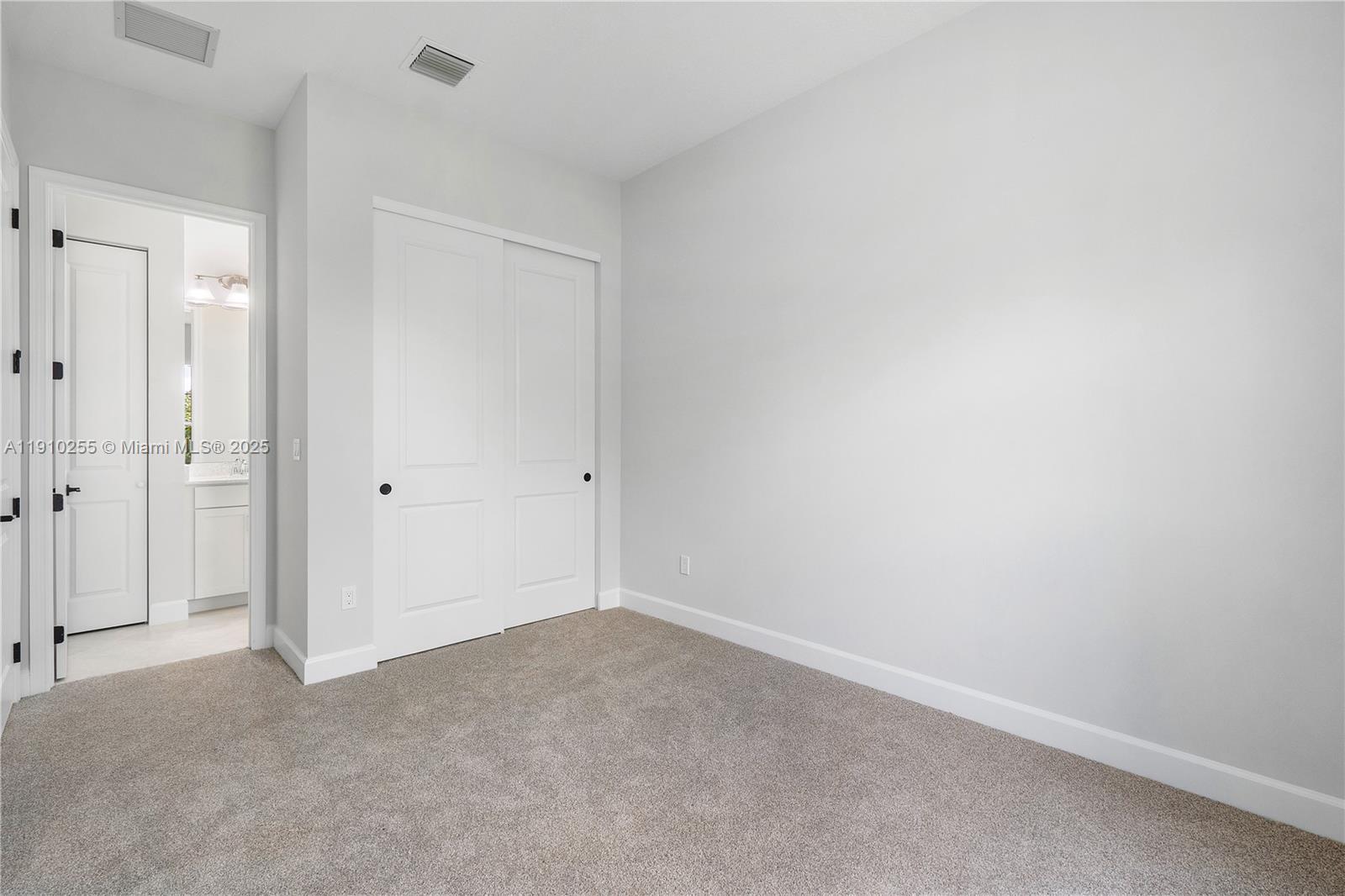 5488 Liberty Lane, Unit 5488 Westlake, FL 33470 - Photo 23 of 39 a view of an empty room