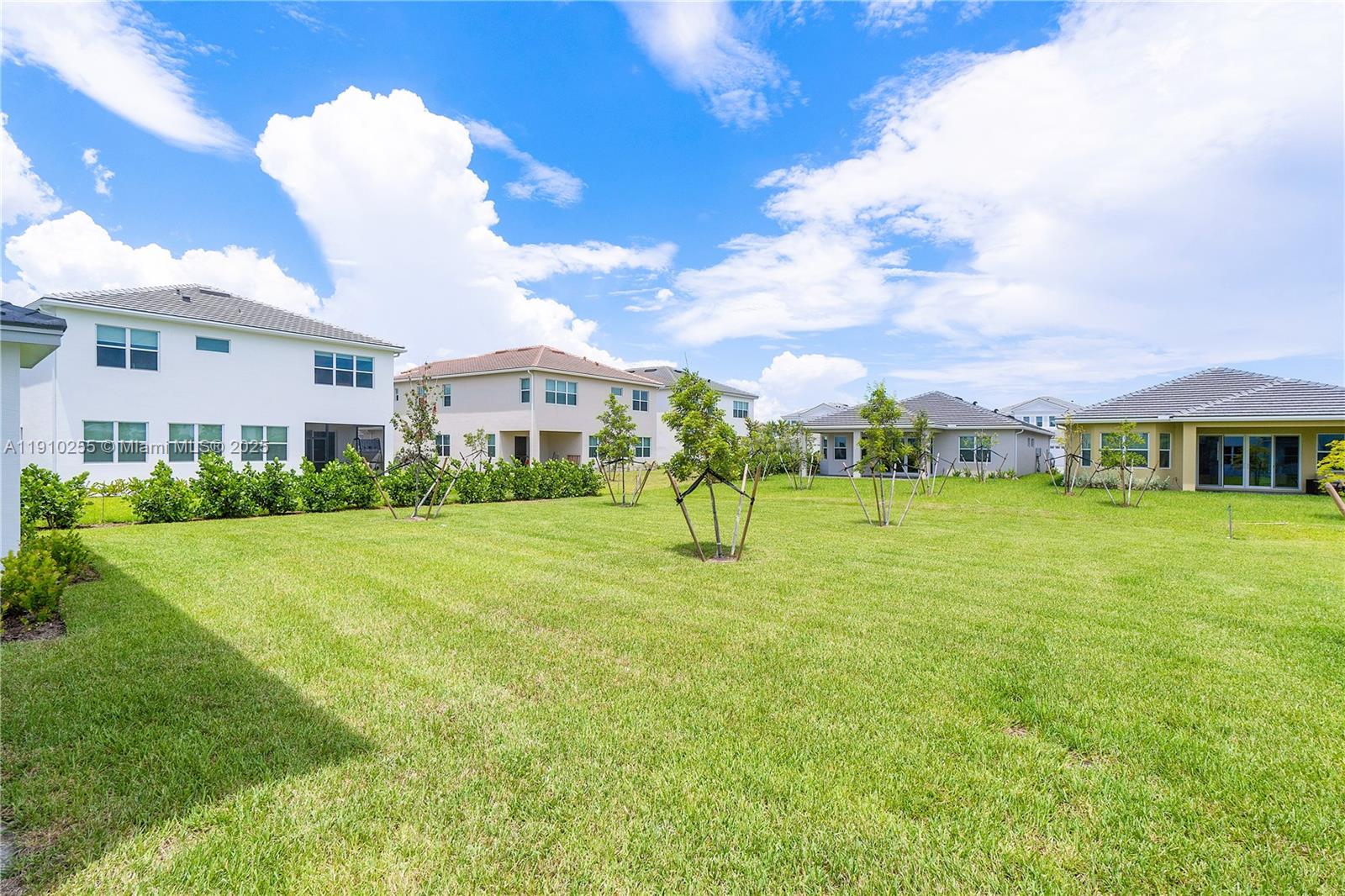 5488 Liberty Lane, Unit 5488 Westlake, FL 33470 - Photo 39 of 39 a house view with a garden space