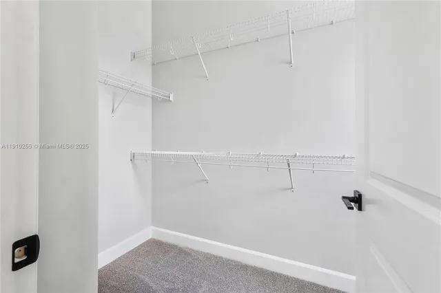 a view of a room with racks on the wall