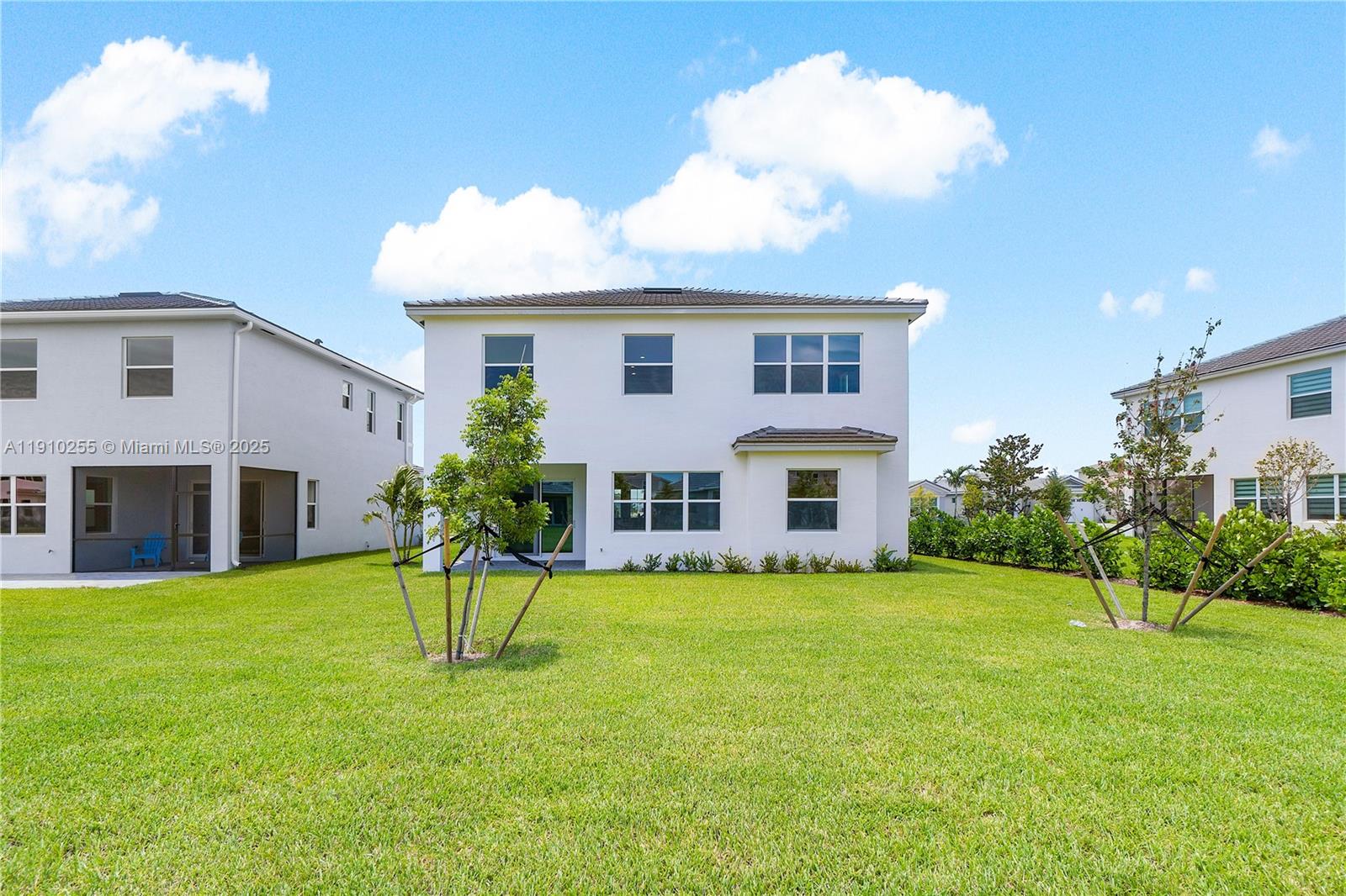 5488 Liberty Lane, Unit 5488 Westlake, FL 33470 - Photo 10 of 39 a view of a house with a backyard