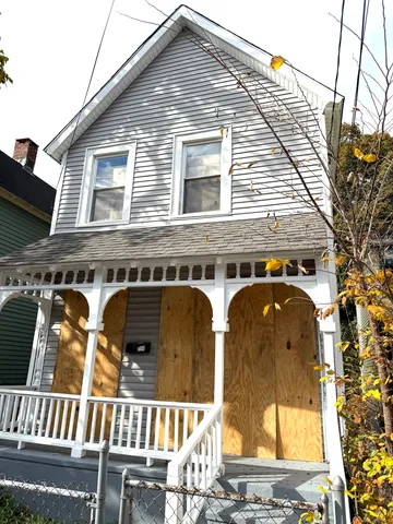 a front view of a house with balcony