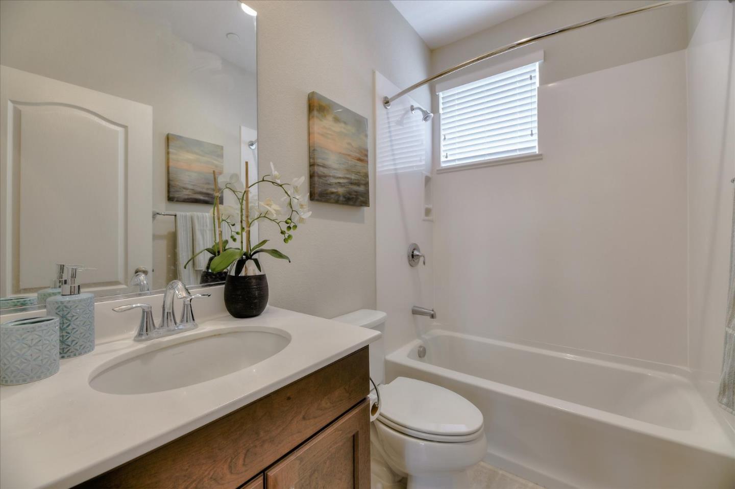 131 Hudson Place San Jose, CA 95123 - Photo 12 of 16 a bathroom with a granite countertop sink toilet and shower